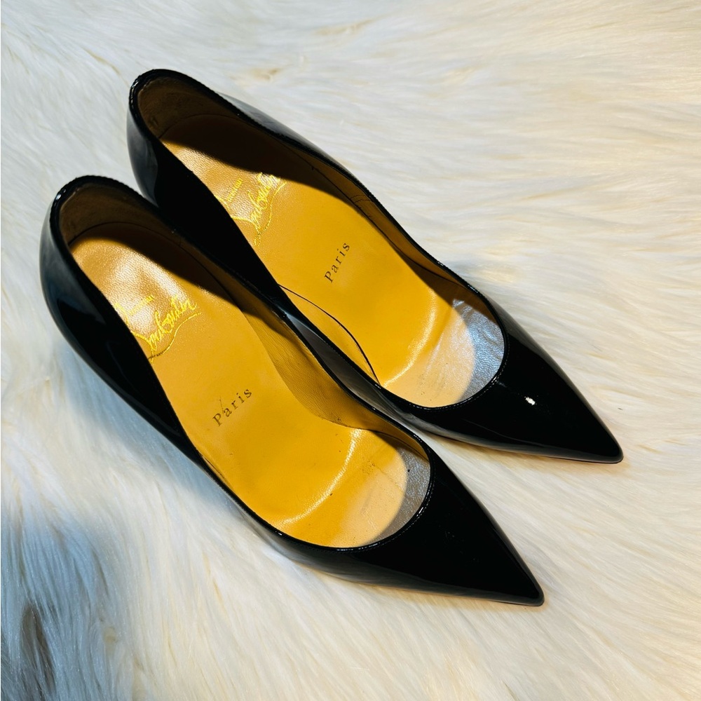 CHRISTIAN LOUBOUTIN
So Kate Patent Pointed-Toe Red Sole Pump